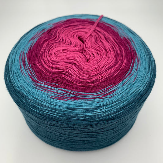 Farbverlauf Bobbel von innen nach aussen in Rosa und Lila hin zu Türkis sowie Dunkelblau