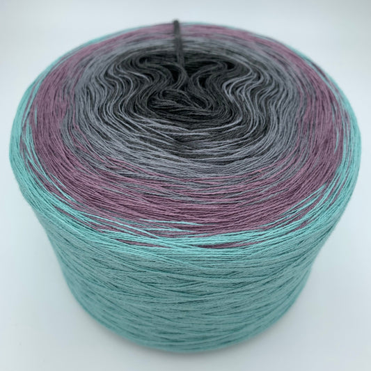 Farbverlauf Bobbel von innen nach aussen in Anthrazit, Grau, Helllila und Türkis