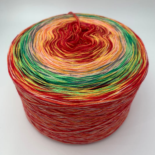 Bunter Farbverlauf Bobbel, von innen nach aussen vorrangig jeweils Rot, Orange, Grün und wieder Rot