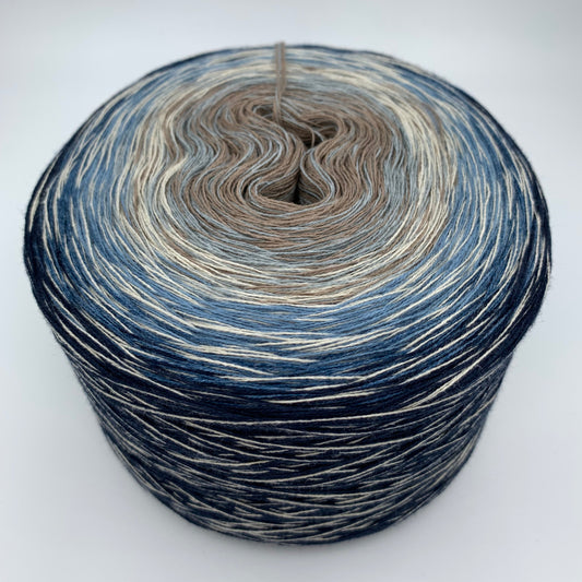 Farbverlauf Bobbel mit durchgänigem Cremefaden, sonnst von innen nach aussen BNraun, Creme und Blautöne