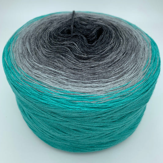 Farbverlauf Bobbel von innen nach auussen in heller werdenden Grautönen, aussen Türkis