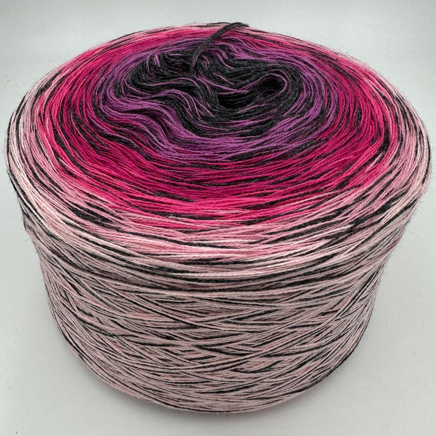 Farbverlauf Bobbel von innen nach aussen Dunkelgrau, Lila, Rot, Pink und Rosa