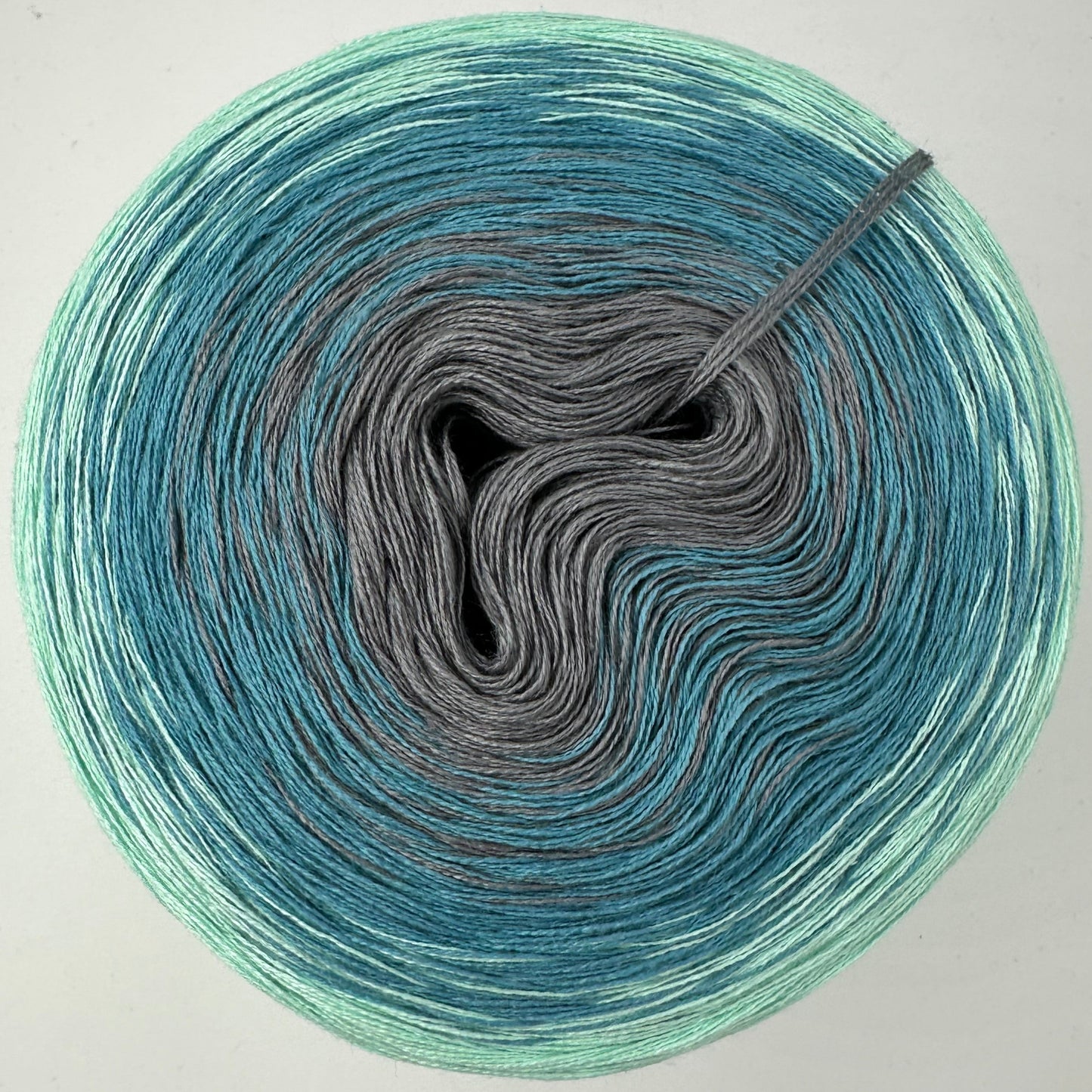 Farbverlauf Bobbel von innen nach aussen Grau, und heller werdende Blau/Grün töne