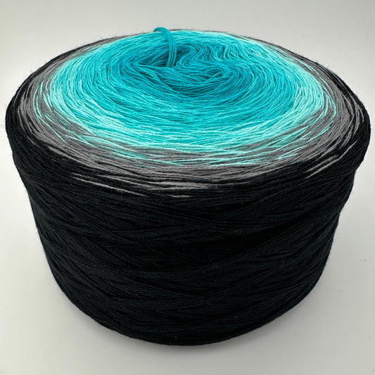 Farbverlauf Bobbel von innen wegf heller werdende Blautöne, Grau und Schwarz