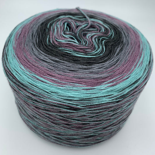 Farbverlauf Bobbel von innen nach aussen Bunt gemischt Lila, Türkis hin zu Dunkelgrau und Grau gefolgt von Lila, Türkis und Grau