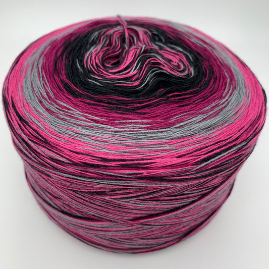 Farbverlauf Bobbel innen Pink, Lila und Hellgrau, folgend Dunkelgrau, Dunkelrosa, Hellgrau, Pink, und etwas Schwarz