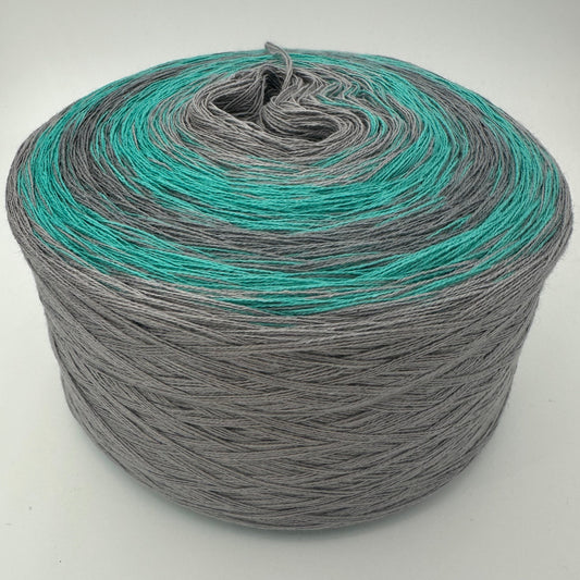 Farbverlauf Bobbel von innen weg abwechselnd Grau und Grün, endet mit Grau