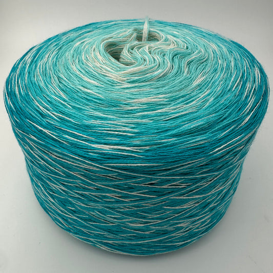 Farbverlauf Bobbel von innen nach aussen teil Creme und Blau in dunkler werdenden Blau und Türkistönen