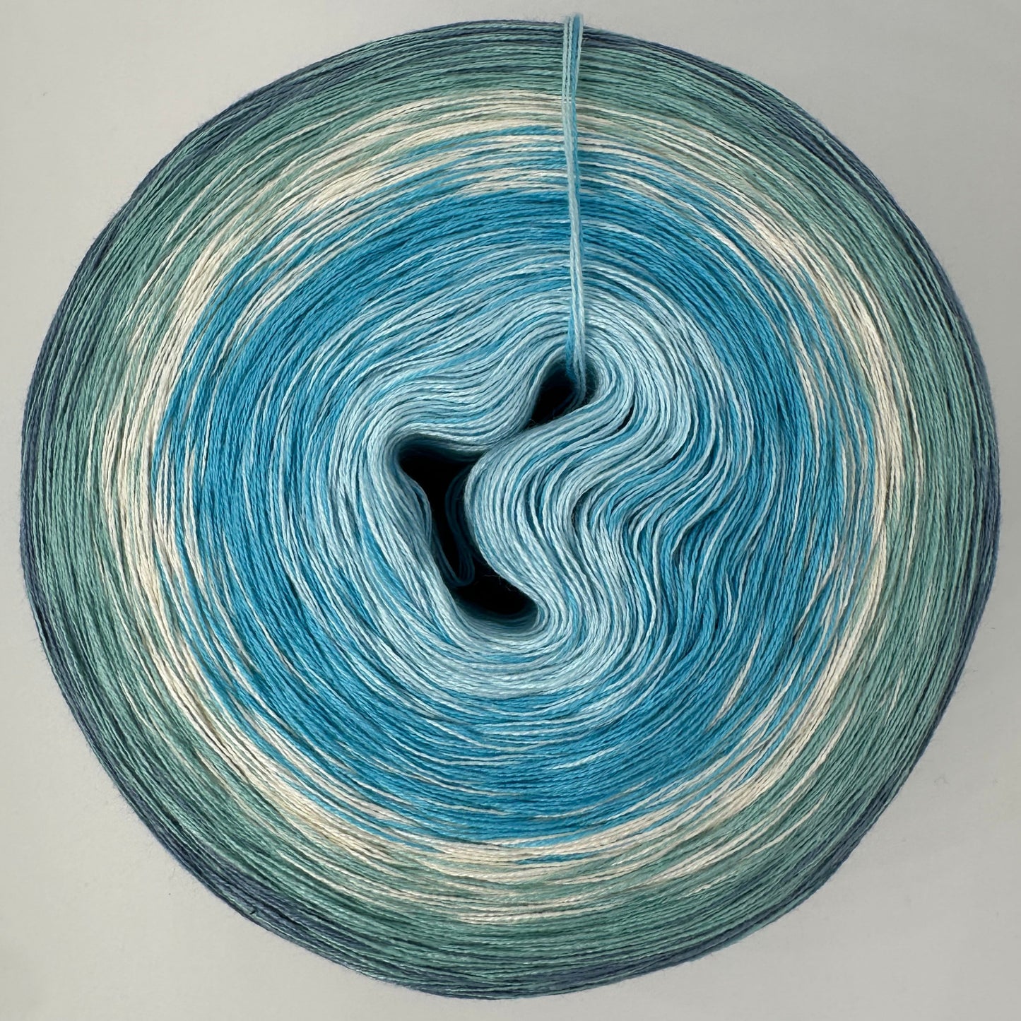 Farbverlauf Bobbel von innen nach aussen Hellblau, Blau, Creme, Grün und Dunkelgrün