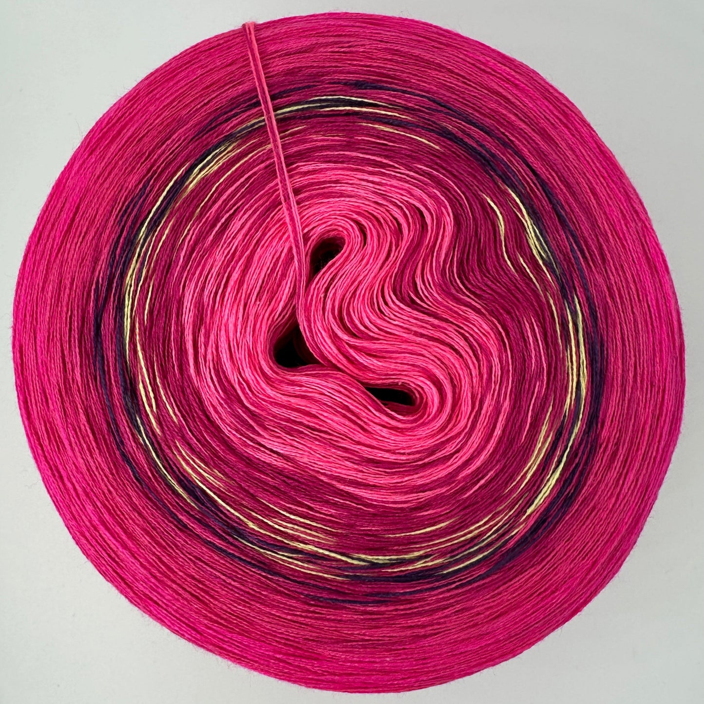Farbverlauf Bobbel in verschiedenen Rosa und Rottönen sowie etwas Lila und Gelb
