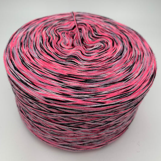 Melierter Bobbel bzw. Mixi in Rosa und einem schwarzen Faden