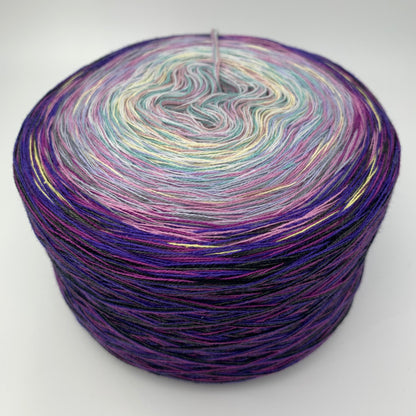 Bunter Farbverlauf Bobbel, von innen nach aussen vorrangig jeweils Orange, Gelb und Lila