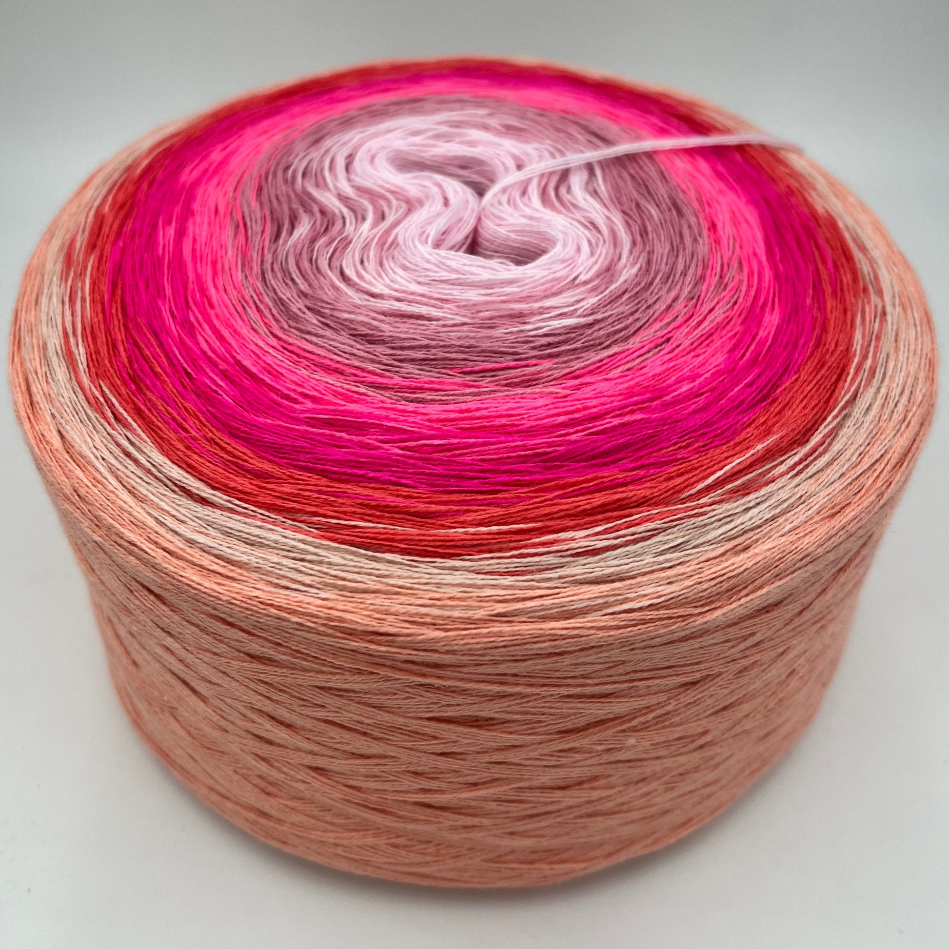 Farbverlauf Bobbel von von innen nach aussen in Rose, Lilatöne, Pinktöne, Rot, Creme und Ocker