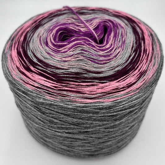 Farbverlauf Bobbel von innen nach aussen vorrangig Lila, Creme, Grau, Lila, Rosa und nochmal Grau
