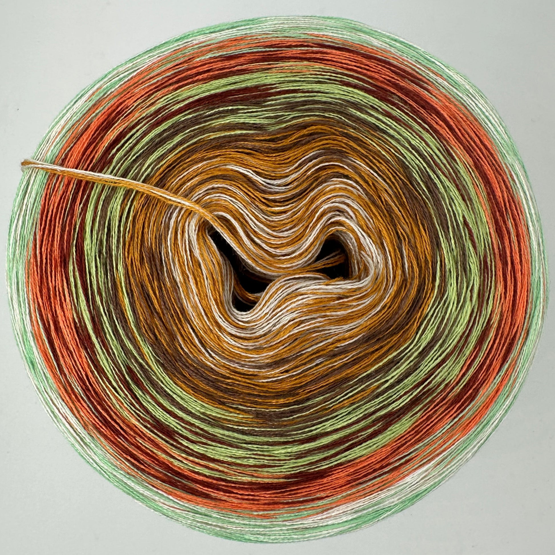 Farbverlauf Bobbel von innen nach aussen Weis, Ocker, Braun, Grün, Orange und Grün