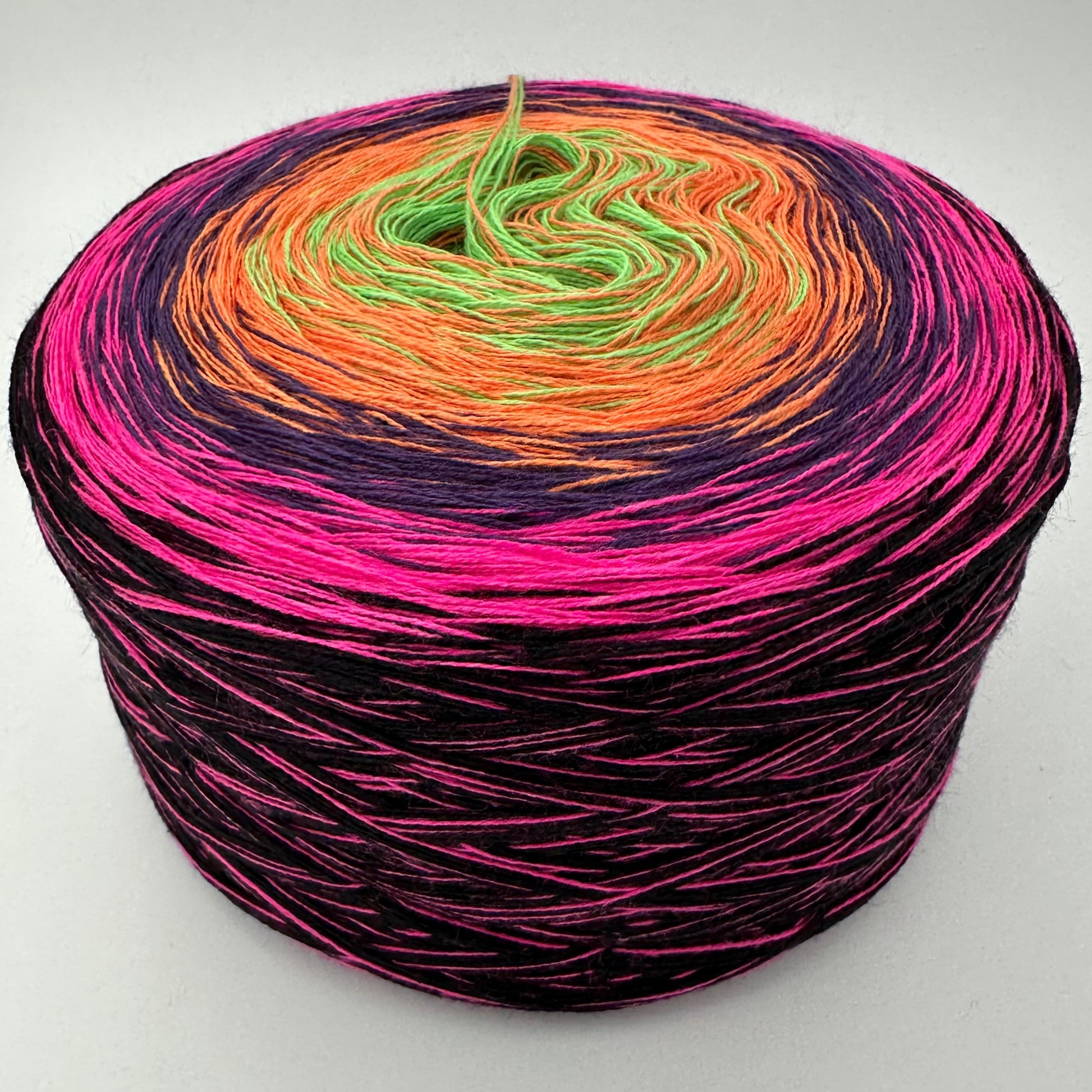 Farbverlauf Bobbel von innen nach aussen Grün, Orange, Lila, Pink und Schwarz