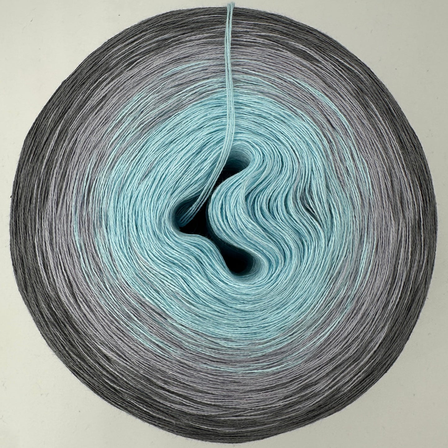 Farbverlauf Bobbel innen Hellblau folgend dunkler werdende Grautöne