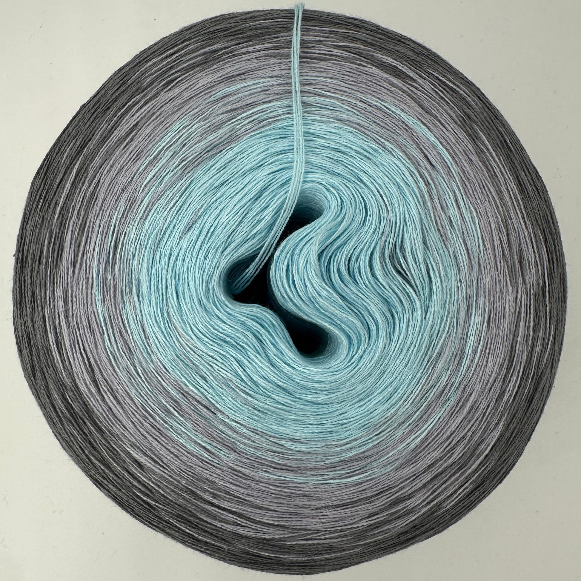 Farbverlauf Bobbel innen Hellblau folgend dunkler werdende Grautöne