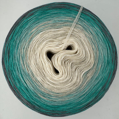 Farbverlauf Bobbel innen dunkler werdende Creme Farben gefolgt von dunkler werdende Grüntöne und aussen Grau