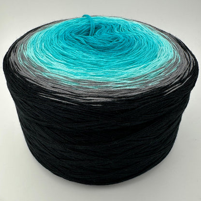 Farbverlauf Bobbel von innen wegf heller werdende Blautöne, Grau und Schwarz