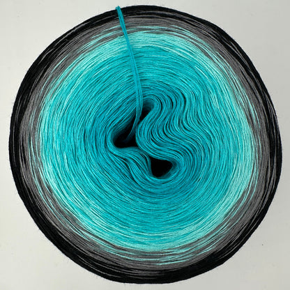 Farbverlauf Bobbel von innen wegf heller werdende Blautöne, Grau und Schwarz