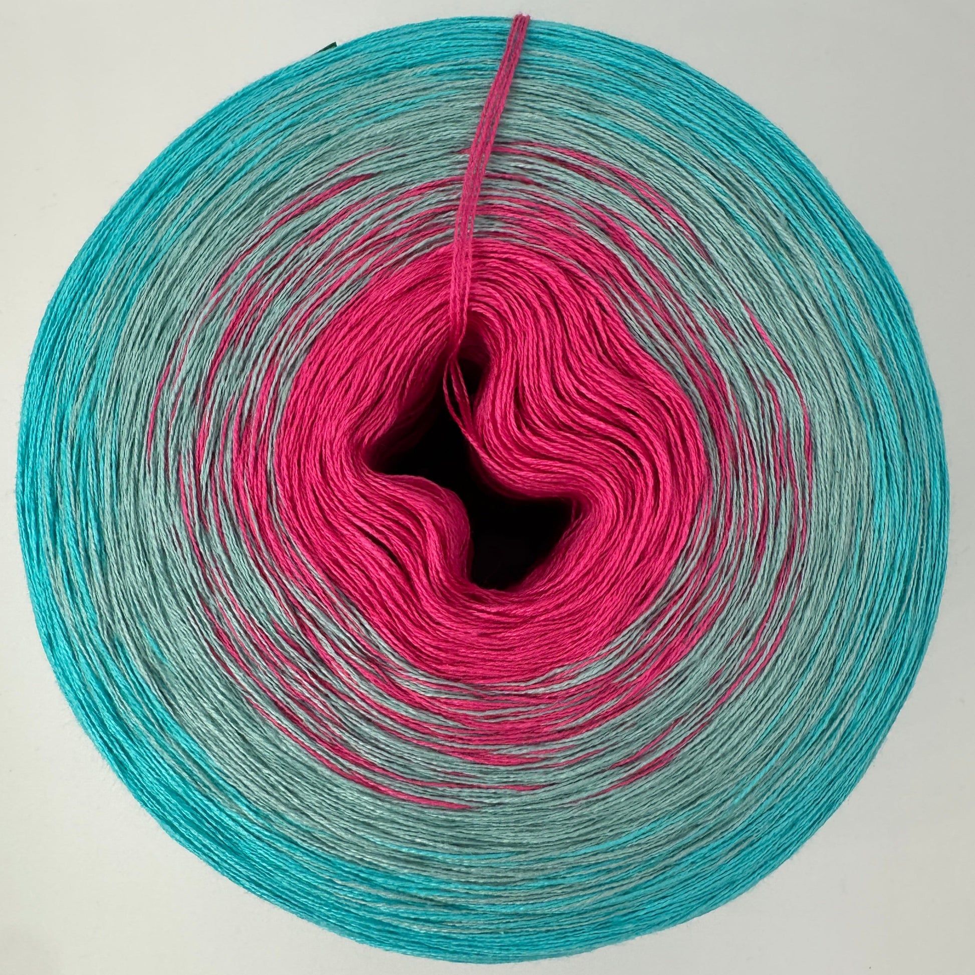 Farbverlauf von innen nach aussen Pink, Grün und Türkis