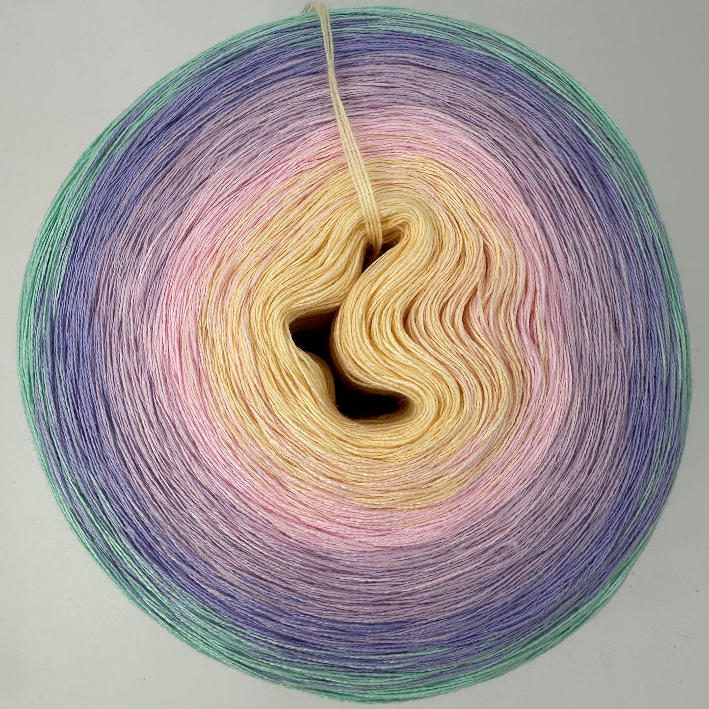 Farbverlauf Bobbel von innen nach aussen Gelb, Rosa, Lilatöne und Grün