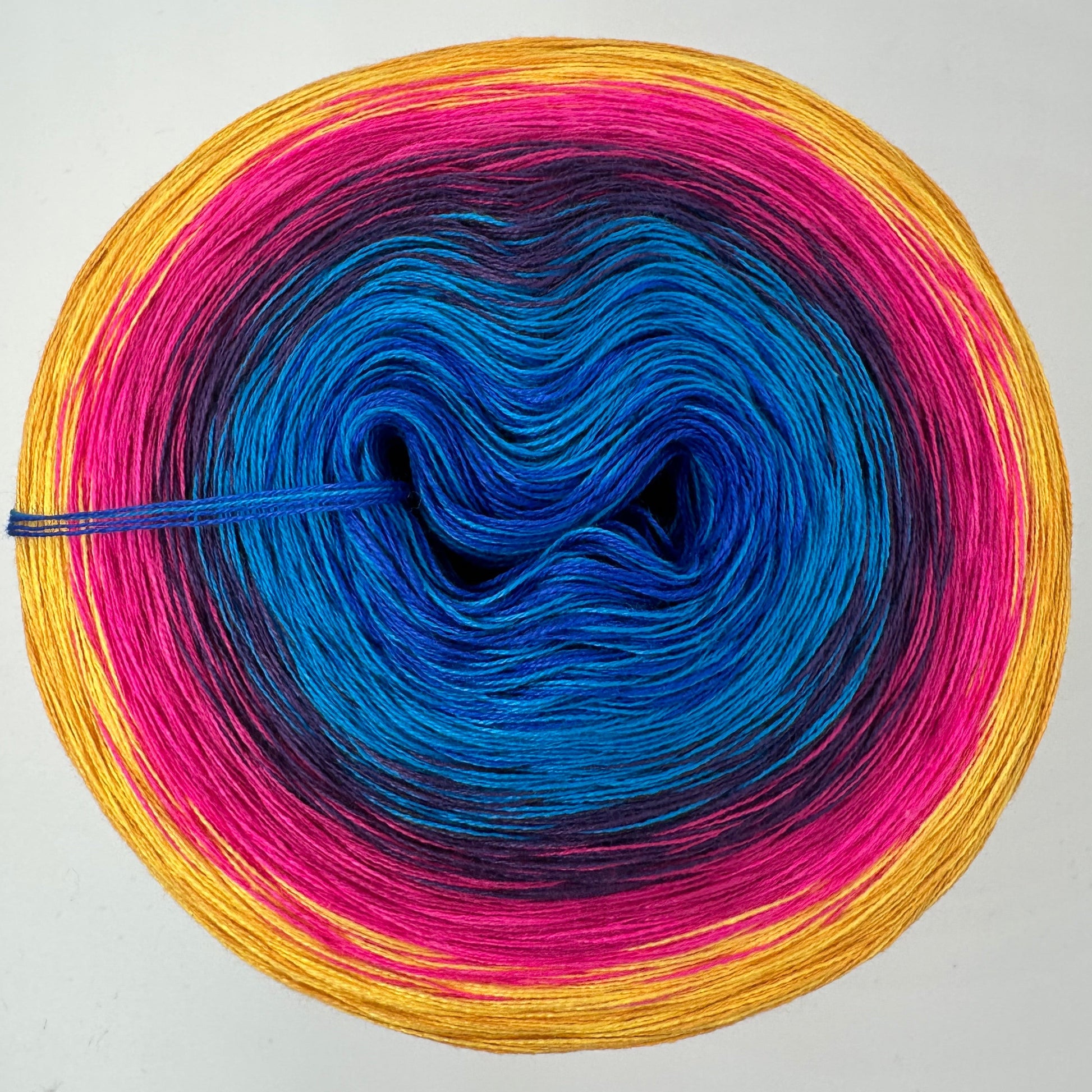 Farbverlauf Bobbel von inne nach aussen dunkelblau, Blau, Lila, Pink und Curry