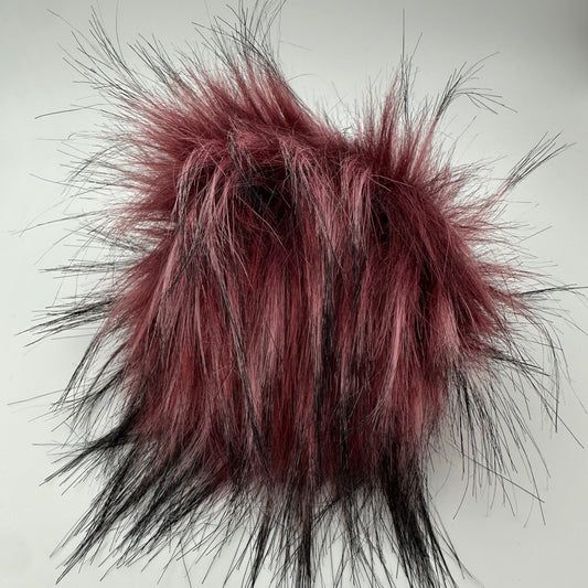 Bommel / Pompon in Beere