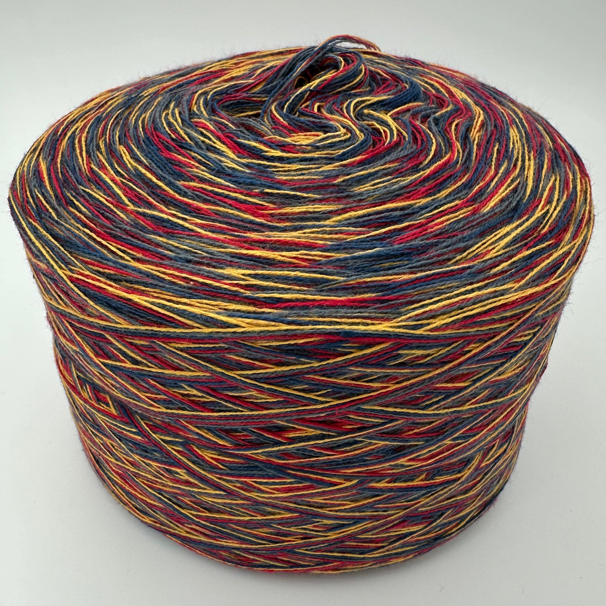 Melierter Bobbel bzw. Mixi in Rot, Gelb, Blau und Grau