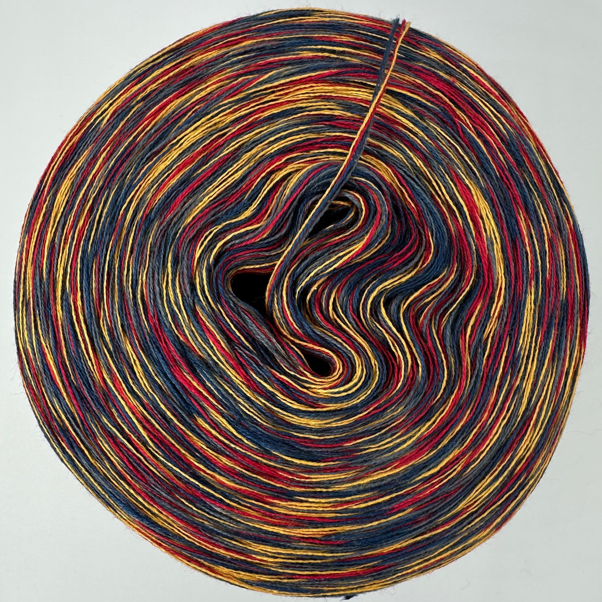 Melierter Bobbel bzw. Mixi in Rot, Gelb, Blau und Grau